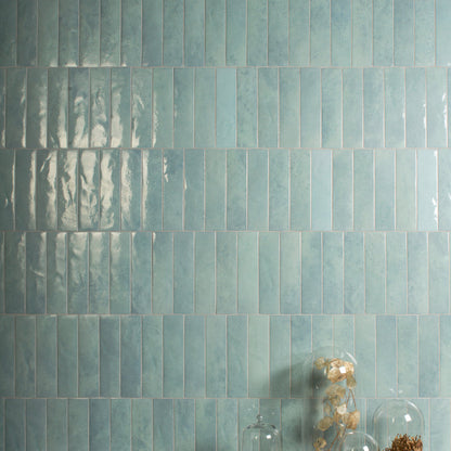 Sensa Mini Ice Polished 6 x 24cm Wall Tile in a room setting