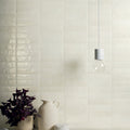 Sensa Mini Salt Polished 6 x 24cm Wall Tile in a room setting