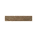 Chestnut brown wood effect blocks laid in a parquet pattern across a floor