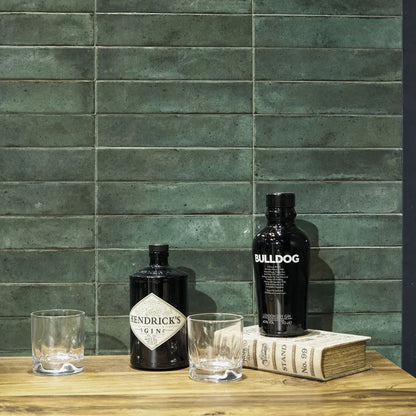 Lisbon Green Jade Shine green ceramic brick tiles detail in a bar setting