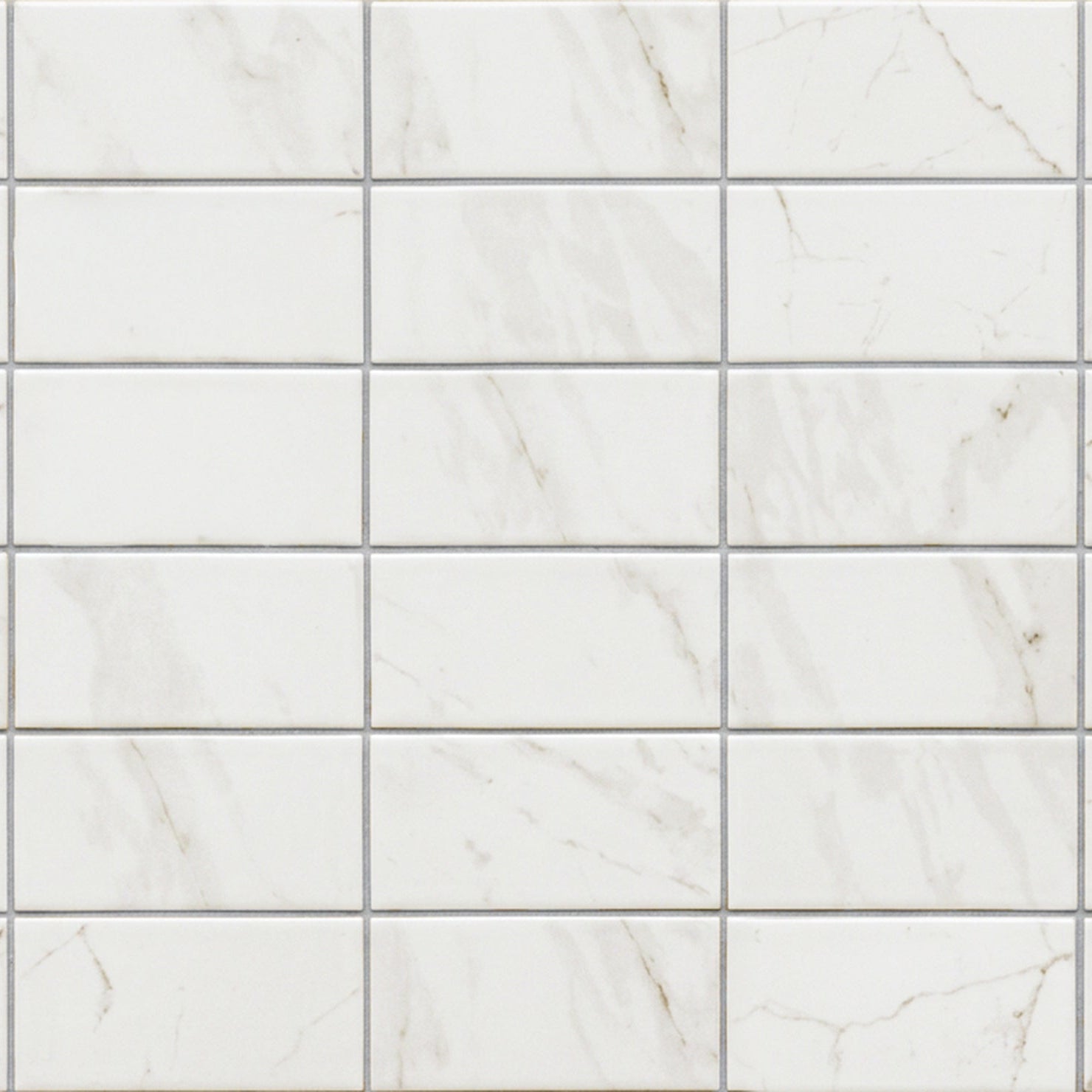 Malmo base white rectangle tiles with subtle gray veining arranged in a white rectangular grid pattern