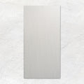 A sleek rectangular gray maison blanc matt glazed ceramic tile with smooth matte finish measuring 60x30cm