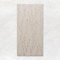 Beige rectangular meadow catkin wall tile 60x30cm with subtle gray leafy vine pattern for indoor use