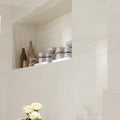 Marvel Bianco Dolomite Lappato white marble-effect tiles with subtle veining and a glossy finish