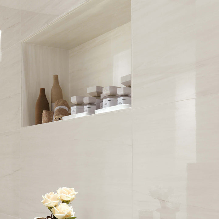 Marvel Bianco Dolomite Lappato white marble-effect tiles with subtle veining and a glossy finish