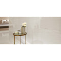 Marvel Bianco Dolomite Lappato white marble-effect tiles with a ceramic vase of white roses