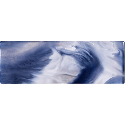 A rectangular ceramic ocean patterned brick tile with deep blue white swirling pattern and subtle metallic flecks