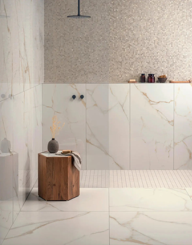 This bathroom showing a smooth glossy finish for wall and floor tiles feature Original Style's Bianco Oro Polished PorcelainTiles stocked by Hyperion Tiles