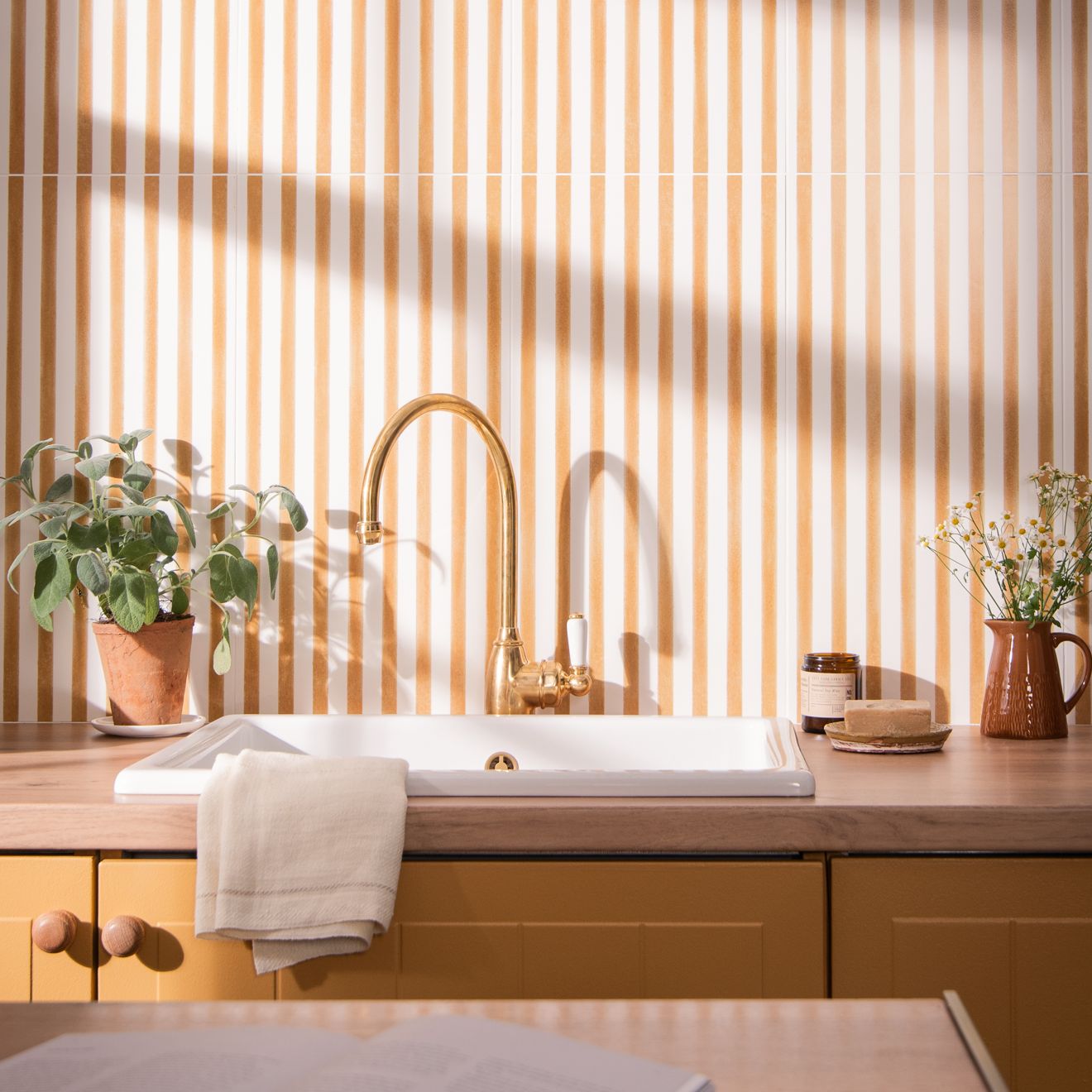 Gold arched faucet with white ceramic handle and base for promenade margate 60x30cm bathroom sink
