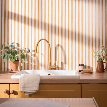Gold arched faucet with white ceramic handle and base for promenade margate 60x30cm bathroom sink