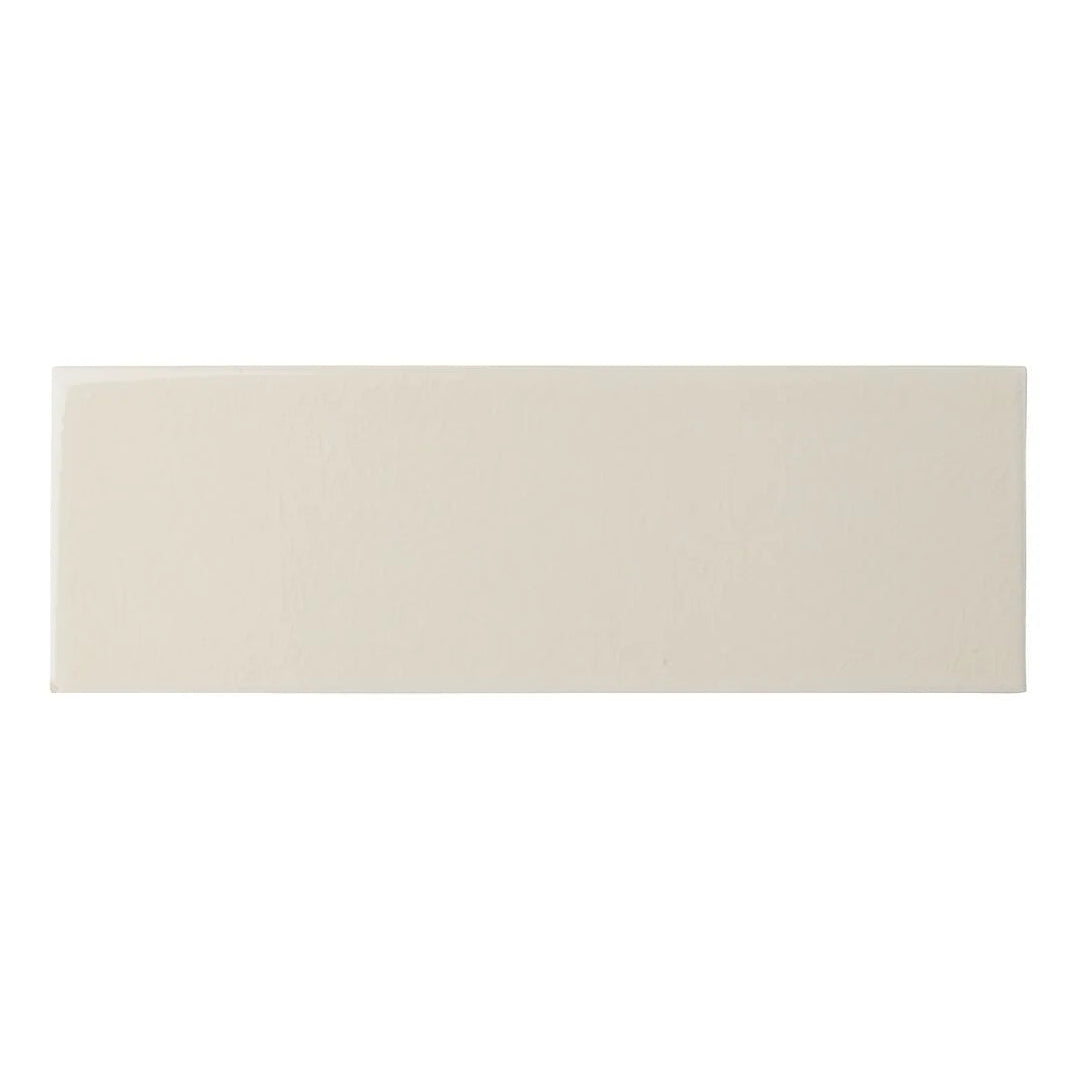 Beige rectangular ceramic tile with a smooth glossy finish from Retro Metro marble arch 10 x 30 glazed tile collection