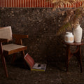 Dark brown rialto terrazzo ca’doro honed wall tiles with speckled stone texture and subtle metallic flecks
