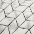 Ritz Carrara Diamond Chevron Mosaic white marble tiles with subtle grey veining in a diamond chevron pattern