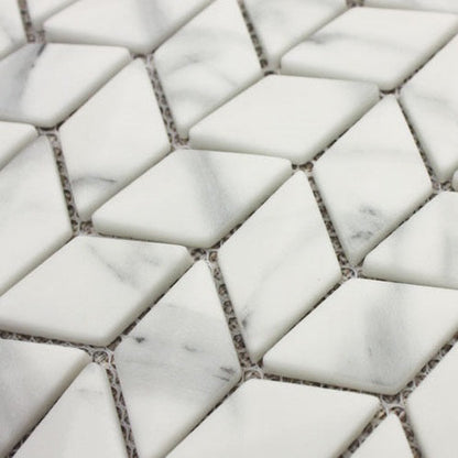 Ritz Carrara Diamond Chevron Mosaic white marble tiles with subtle grey veining in a diamond chevron pattern