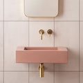 A sleek rectangular pink concrete sink rush white 60x30cm with a matte finish and subtle speckles