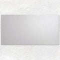 A sleek rectangular mirror with a smooth matte silver finish from rush white 60x30cm collection