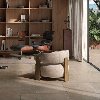 Modern interior with wooden bookshelf, chair, and table in a well-lit room.
