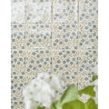 STUDIO Sanderson Anaar Pottery Blue tiles laid up as a panel of repeating pomegranates