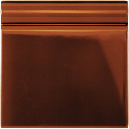 Teapot brown skirting tile made of copper-colored glossy ceramic with a raised ridged border design