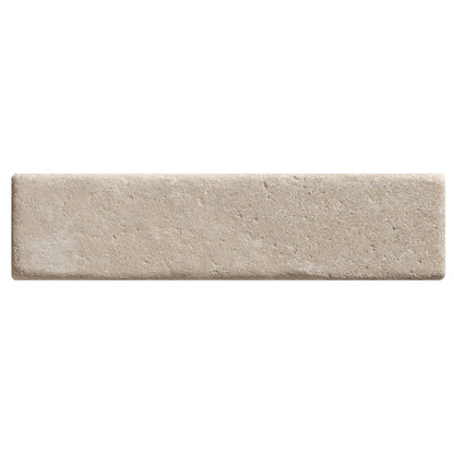 Beige rectangular tile with a textured stone like surface from trafalgar sandstone tumbled klinkers collection
