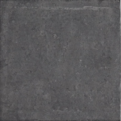 Urban charcoal plain porcelain tile in dark gray with a rough textured surface and subtle tonal variations