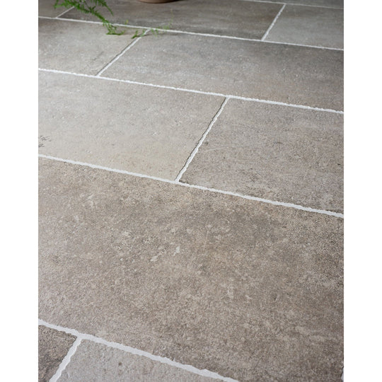 Wetherby Porcelain aged flagstone-effect floor in a room setting