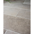 Wetherby Porcelain aged flagstone-effect floor in a room setting