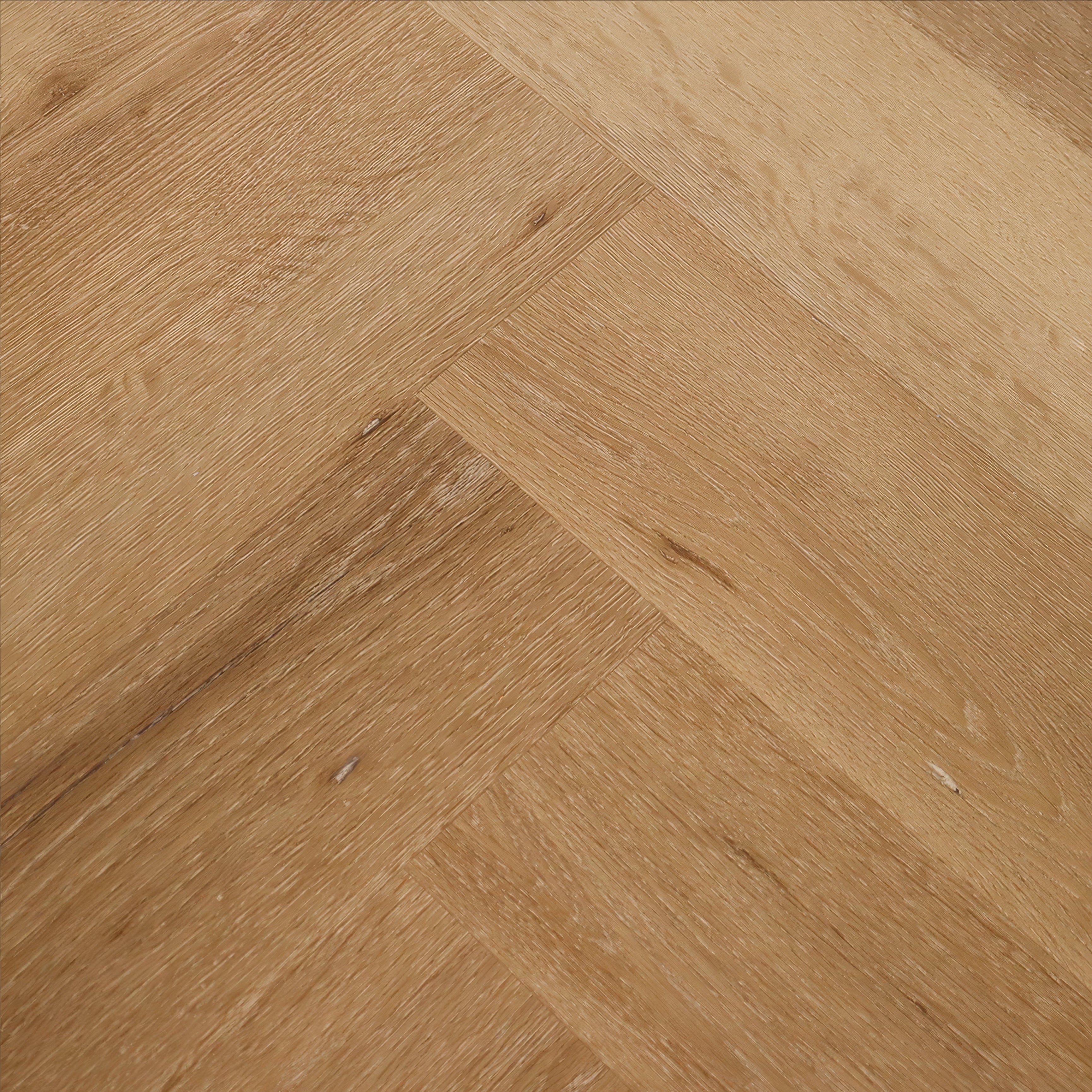 Close-up of Woodpecker Weymouth Malted Oak Herringbone Flooring