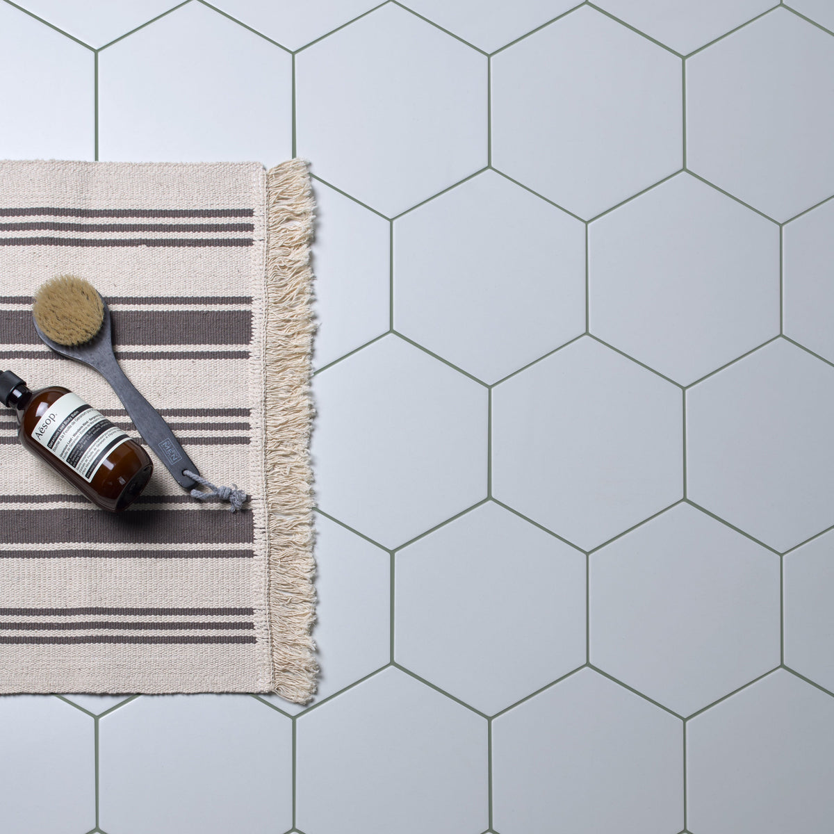Ca'Pietra Resin-Cement Grout in Olive (No.19), a matt resin-cement tile grout shown as a cured colour swatch