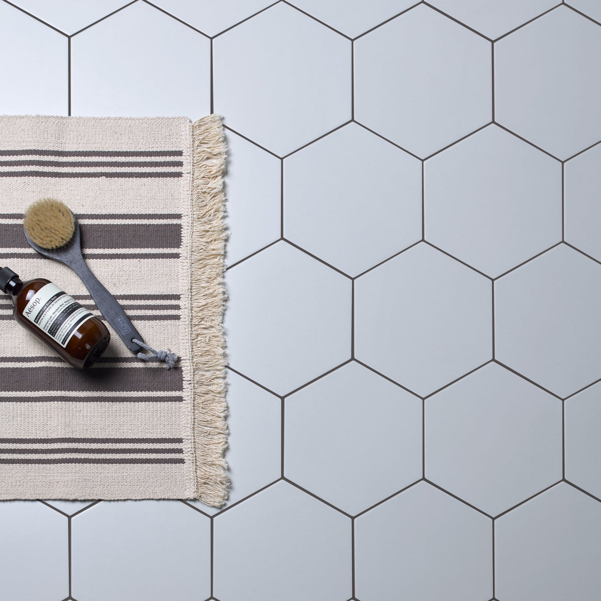 Ca'Pietra Resin-Cement Grout in Fig Black, shade No.38, a matt Kerakoll Fugabella grout for interior and exterior tile joints