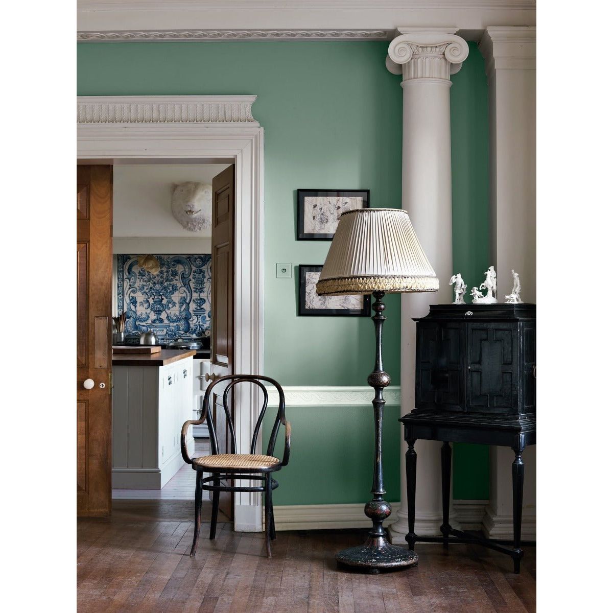 A dip in the lake tall floor lamp with pleated beige shade and intricate dark metal base for elegant lighting