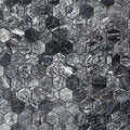Close detail of polished Platinum Black marble hexagons showing pale silver veining