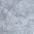 Calacatta Nimbus Cloud honed marble tile with soft diffuse grey figuring drifting across a cool white ground