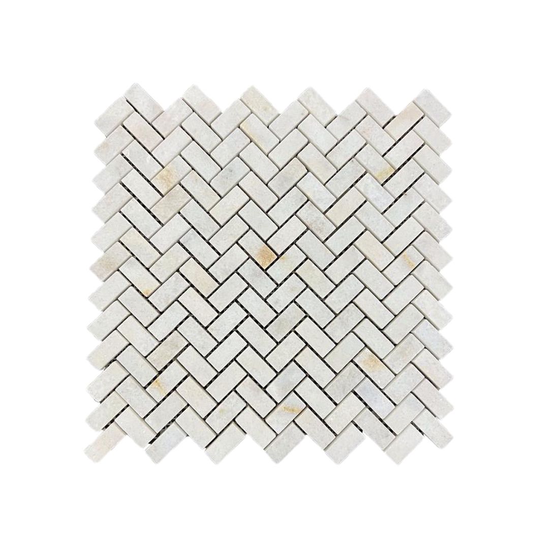 Honed Calacatta Sugar marble herringbone mosaic sheet in bright white with gold and taupe veining