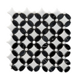 Overhead view of the black and white marble flower pattern repeating across several sheets