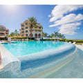 Abalone Ocean Iridescent Glass Mosaic turquoise iridescent glass mosaic lining a curved swimming pool