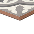 Abbey Waverley patterned ceramic tile featuring gray and white design with a rustic brown edge for decorative use
