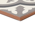 Abbey Waverley border tile featuring a gray and white patterned ceramic tile with a terracotta-colored edge