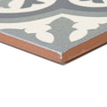 Abbey Wrightington patterned tile in gray and white ceramic with a rustic terracotta edge for decorative flooring