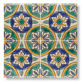 Hand-painted ceramic tile Acapulco Amaya 10x10cm with blue and green floral motifs on off-white background