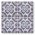 White ceramic acapulco lozano 10x10cm tile with intricate blue and brown floral patterns