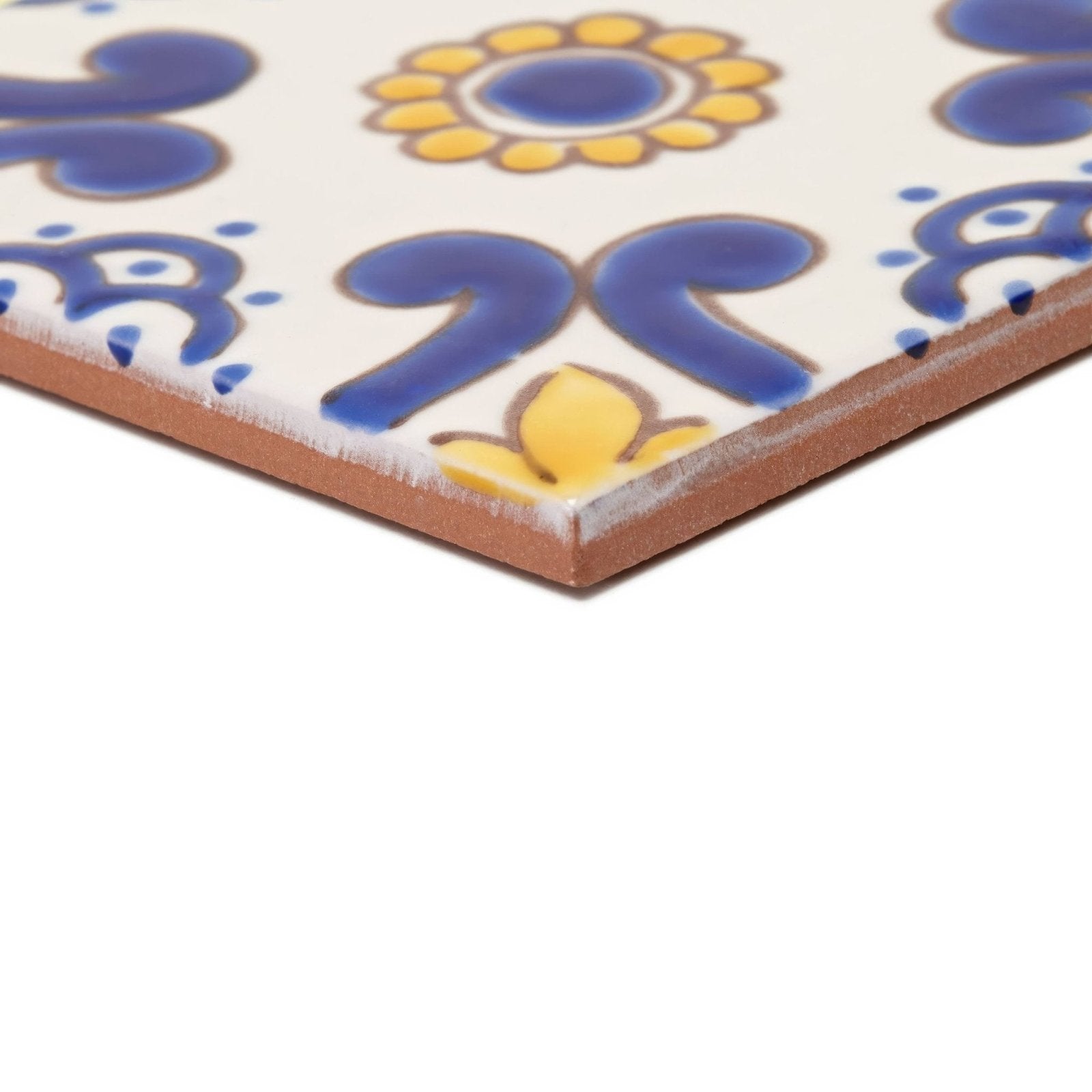 Acapulco ortiz 10x10cm square ceramic tile with white surface blue and yellow floral patterns and unglazed terracotta edge