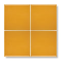 Four glossy mustard yellow square ceramic tiles arranged in a grid acapulco yellow city 10x10cm