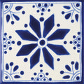 Blue and white ceramic tile acapulco zenil 10x10cm with central starburst floral design and decorative leaf motifs