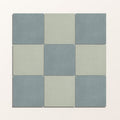 Nine square porcelain tiles in a 3x3 grid alternating muted blue gray and soft sage green with matte finish
