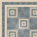 Blue and cream geometric patterned adventuras linen field porcelain floor tiles with a vintage-inspired design