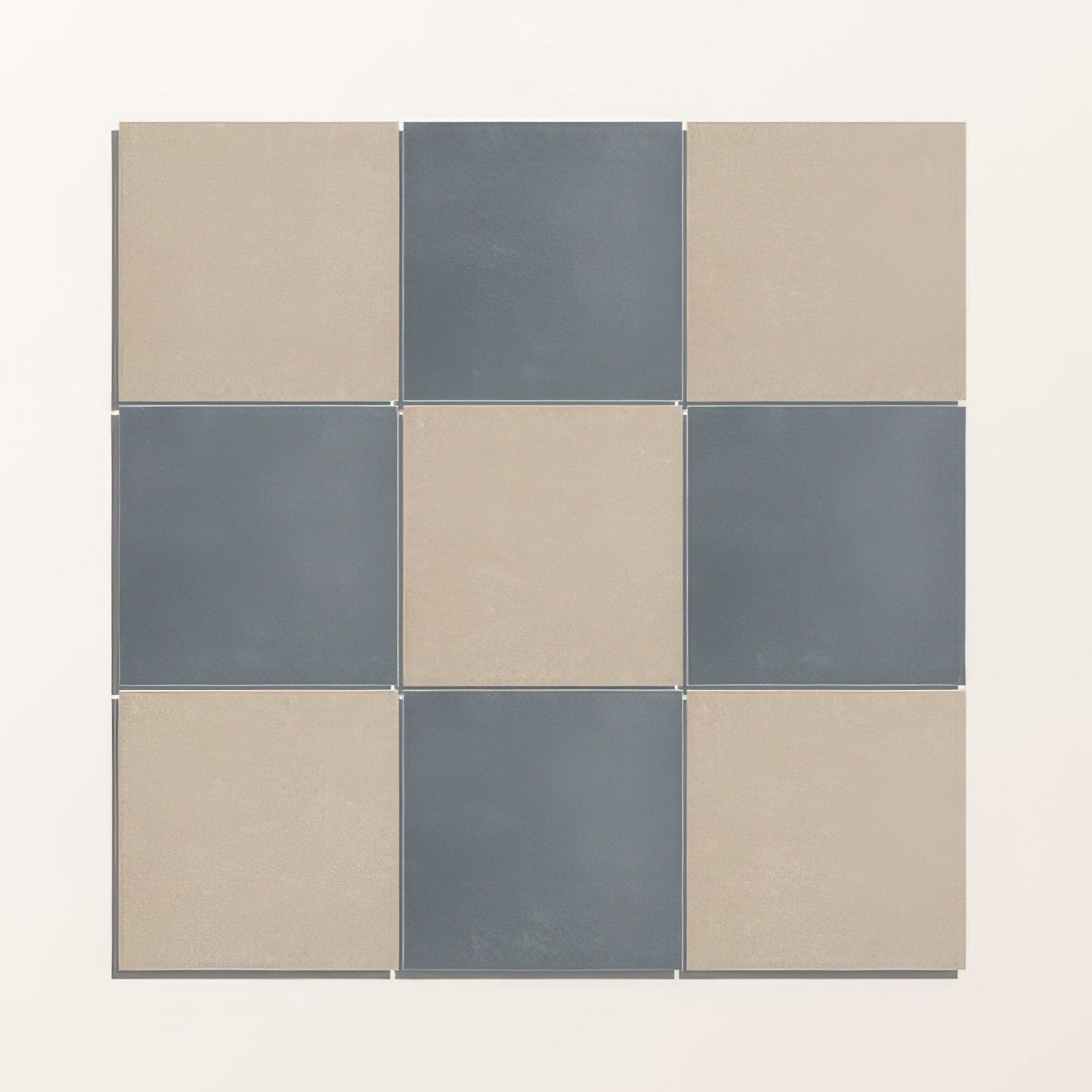 Nine adventuras navy field porcelain square tiles in muted beige and slate gray with smooth matte finish arranged in a grid