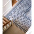 Blue and white geometric patterned porcelain floor tile with vintage-inspired design from adventuras navy field collection