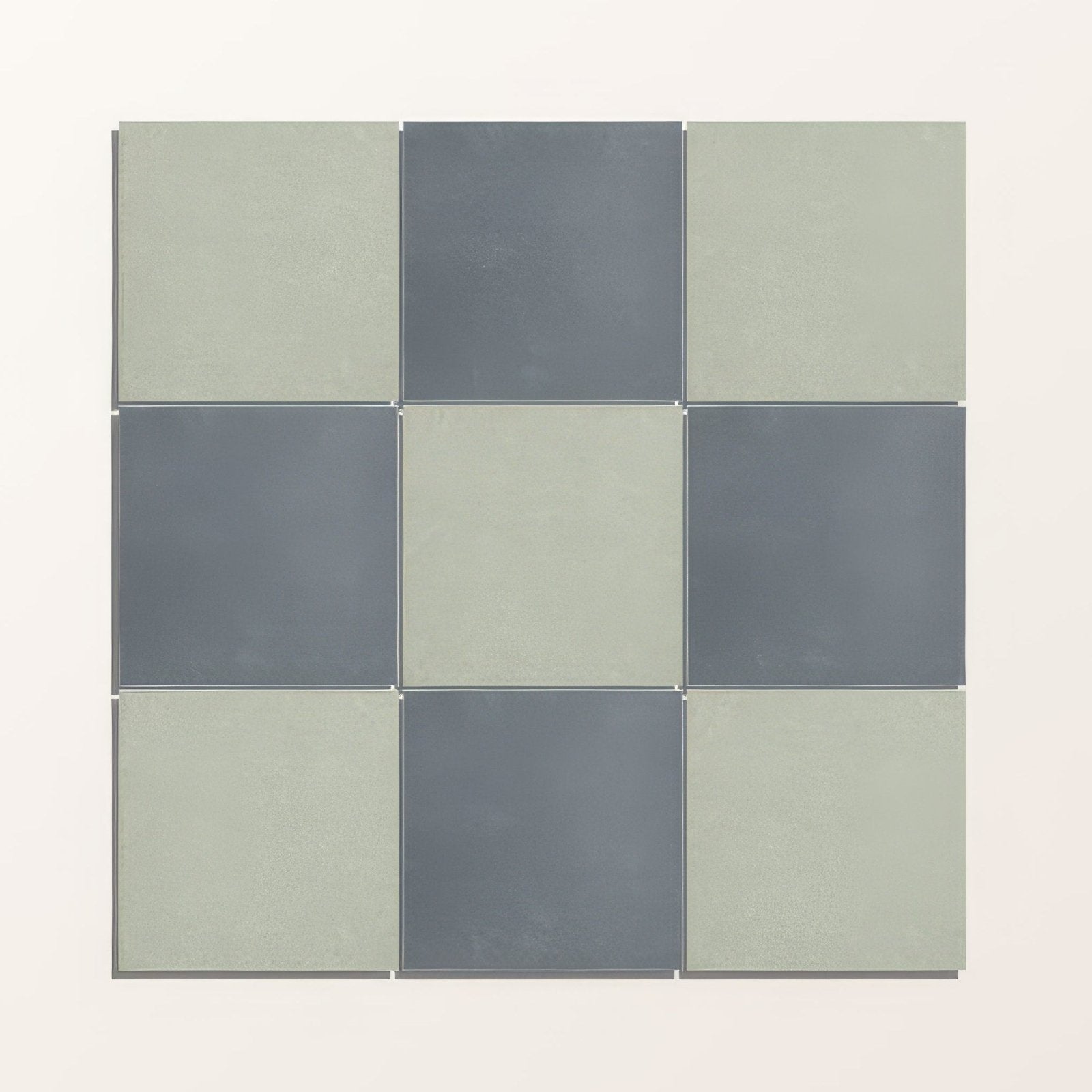 Nine square porcelain tiles in a 3x3 grid alternating matte sage green and muted charcoal gray adventuras olive field