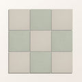 Nine adventuras olive field porcelain tiles in muted sage green and soft beige with smooth matte finish arranged in a grid